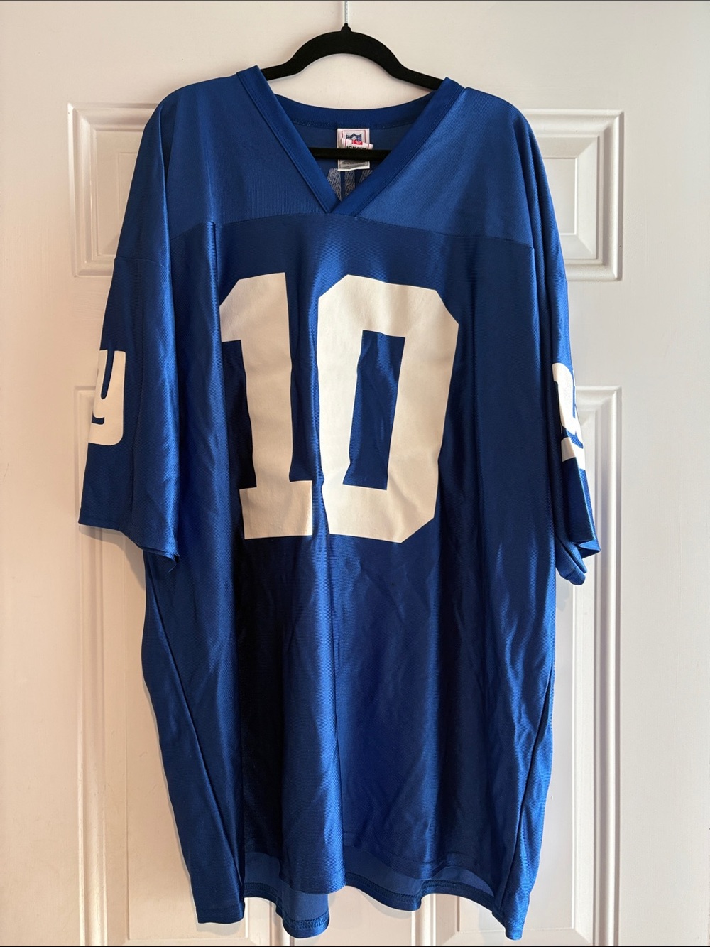 NFL Manning Blue and White Logo Tag Close-Up